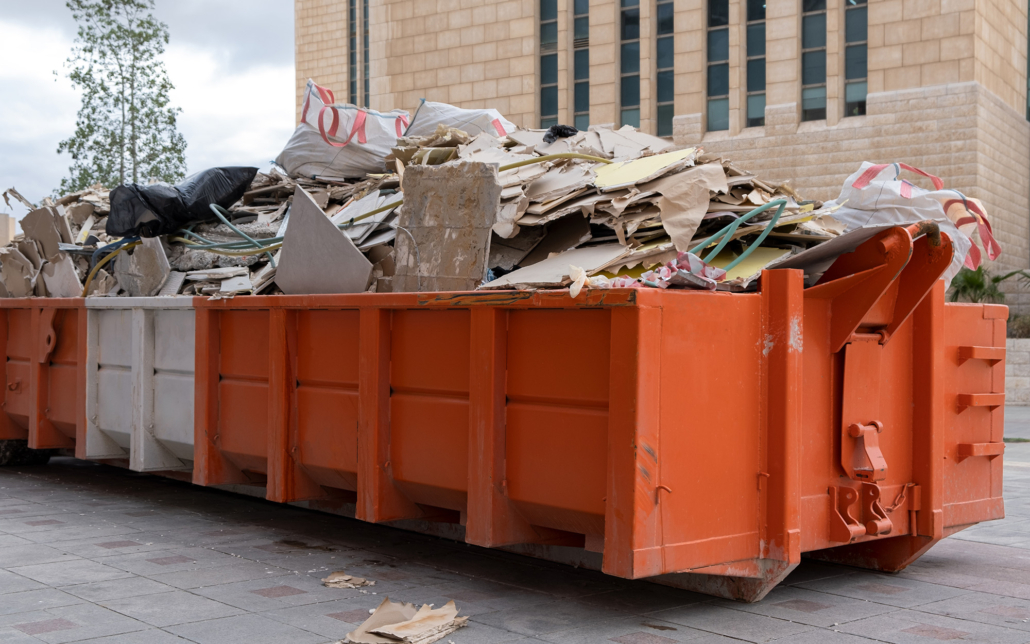 Orange Dumpster Filled With Debris