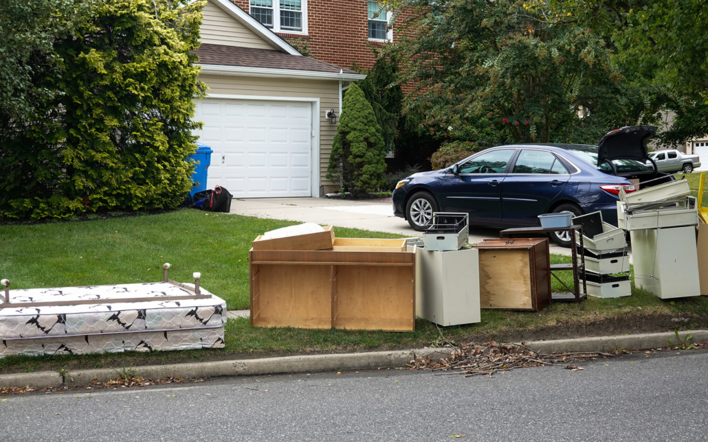 Junk Pickup Outside Suburban House
