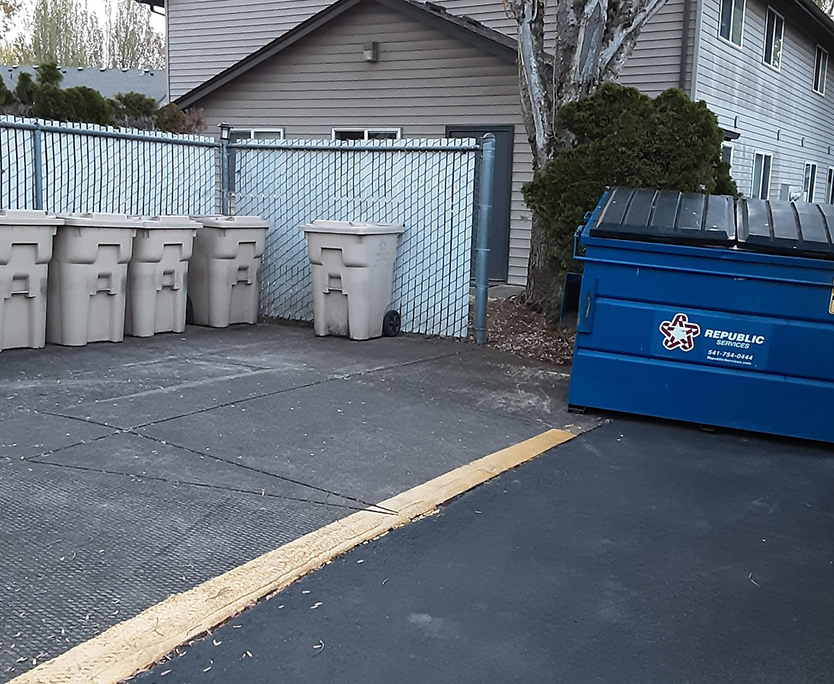 Repubcil Services Dumpster Near Trash Cans