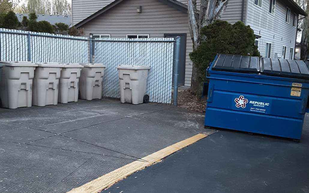 Republic Services Trash Can Near Apartment Complex